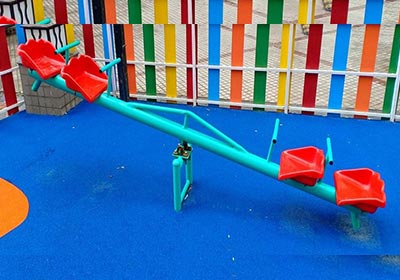 Multi Seater see saw with playground flooring